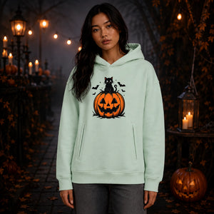 Feline friend on carved pumpkin Halloween Oversized Hoodie