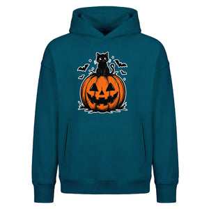 Feline friend on carved pumpkin Halloween Oversized Hoodie