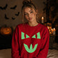 Mischievous feline face Glow in the Dark Unisex Sweatshirt