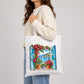 Scenic coastal window view with vibrant flowers cotton Tote Bag