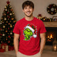 Sly smirking face holiday lights Christmas Unisex T-Shirt